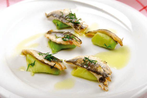 sardines in olive oil on cucumber slices